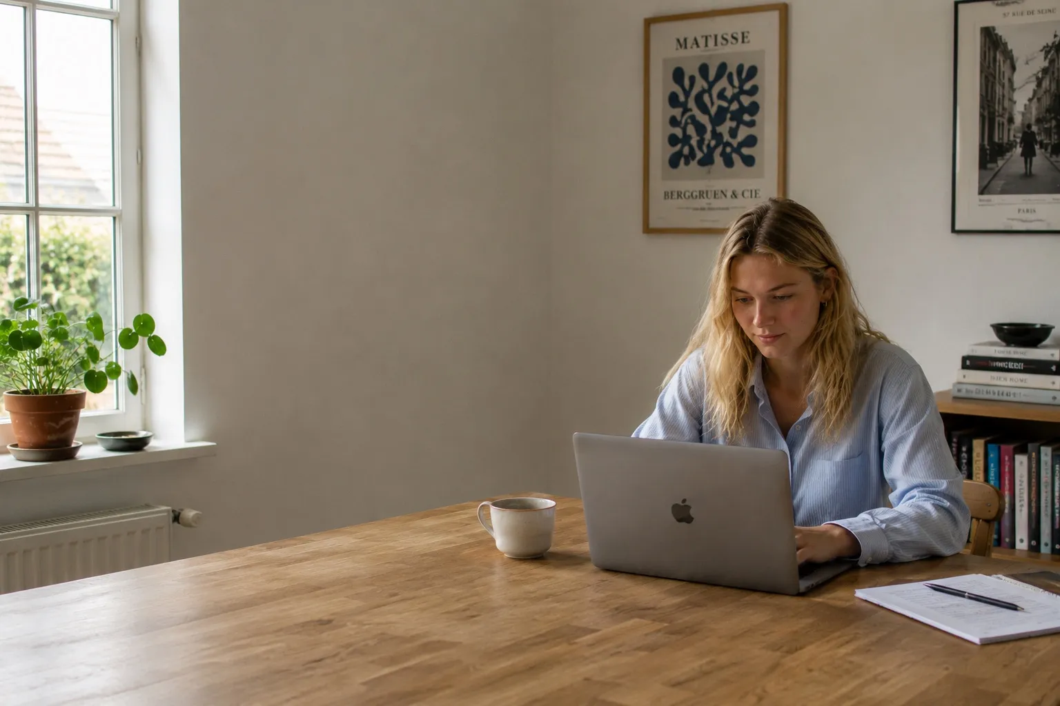 A student studying at her laptop